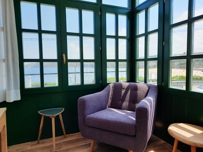 Apartamentos El Muelle โกมิญาส ภายนอก รูปภาพ