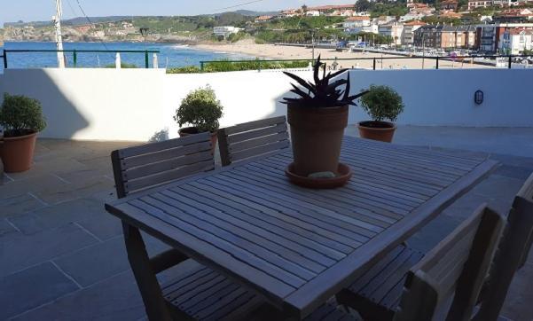 Apartamentos El Muelle โกมิญาส ภายนอก รูปภาพ