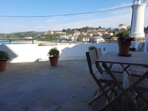 Apartamentos El Muelle โกมิญาส ภายนอก รูปภาพ