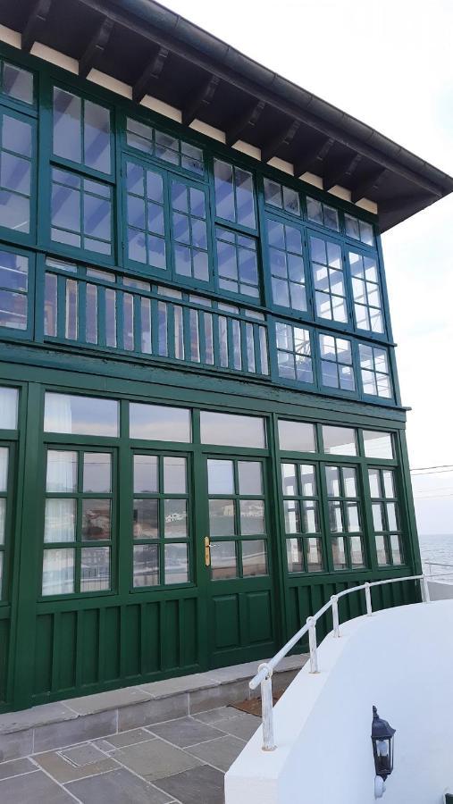 Apartamentos El Muelle โกมิญาส ภายนอก รูปภาพ